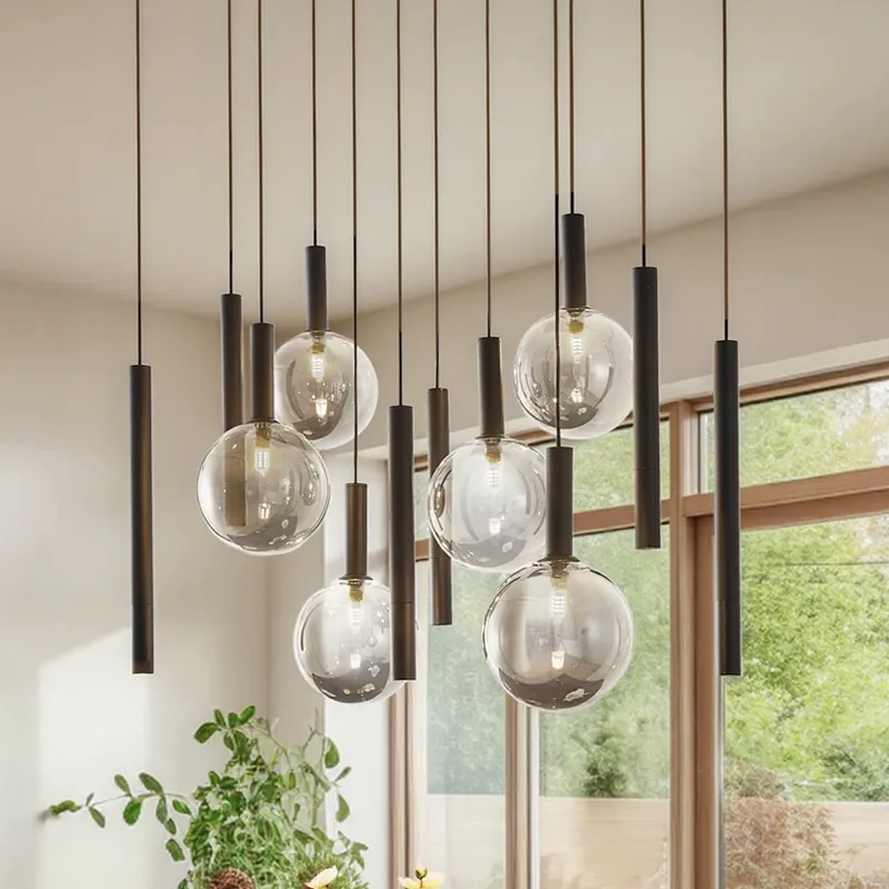 Premium Lucande hanglamp Lumavia, 12-lamps, glas, zwart/helder, G9