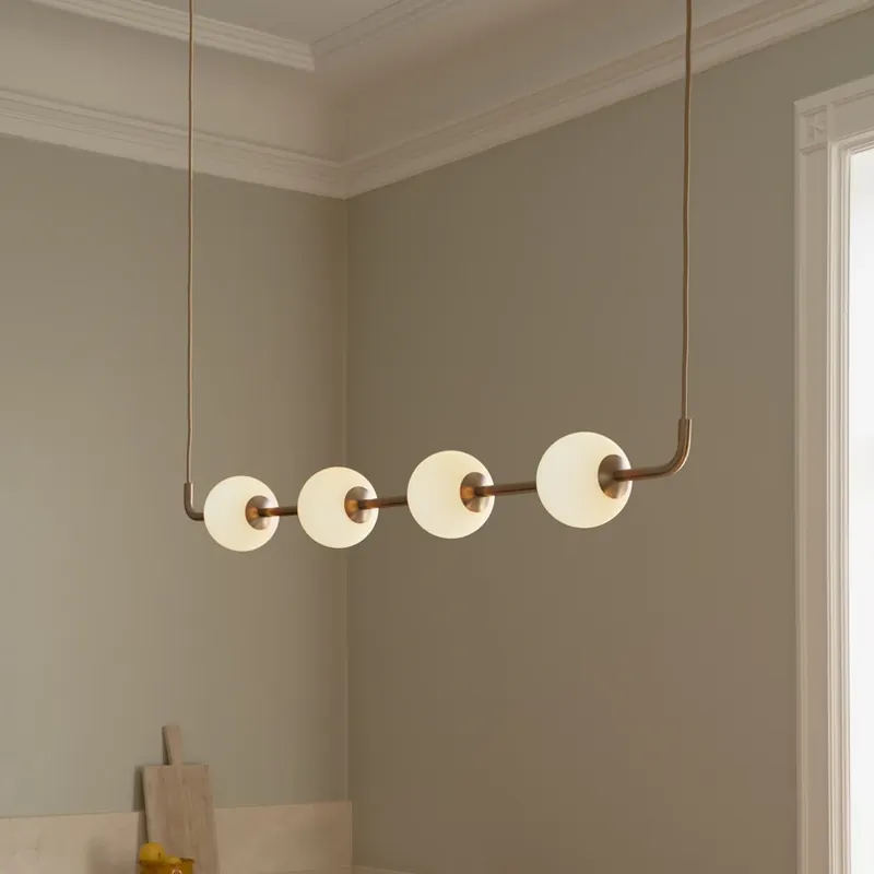 UMAGE LED hanglamp Audrey LINEAR, messing, 118 cm 4-lamps. Gecertificeerd